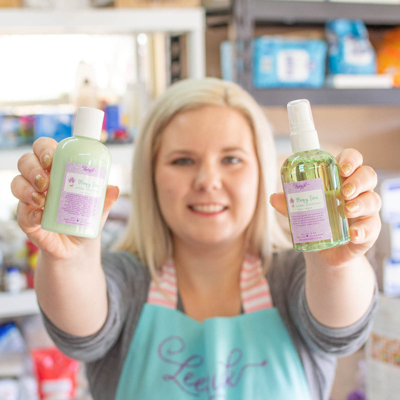 Alicia Leebrick holding Sleepy Time Lotion and Body Spray