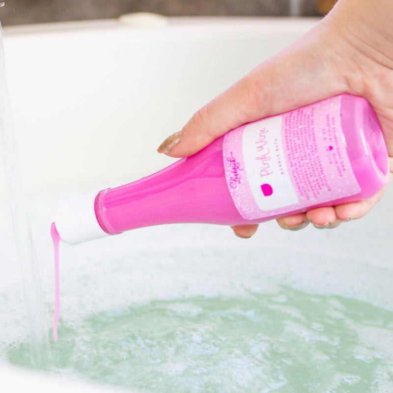 Pink Wine Bubble Bath poured into bath water