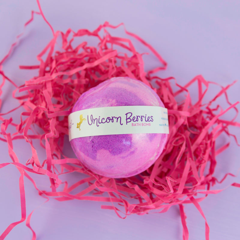 Unicorn Berries Scented Bath Bomb on pink crinkle paper