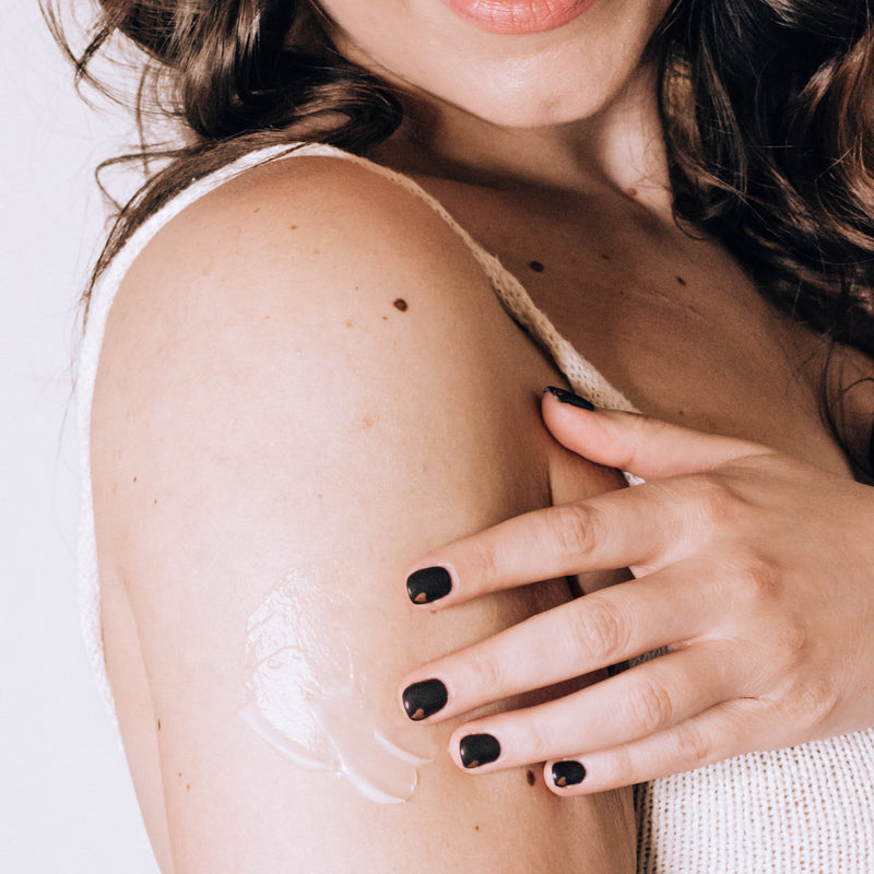 Woman using Leebrick Lotion